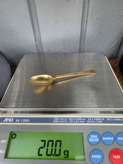 Tiffany & Co. 18K solid gold teaspoon. Marked on reverse. Monogram. 4.75in length. 20 grams.