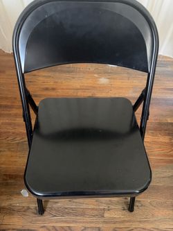 Black holding chair