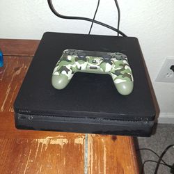 Black original ps4 with controller + games