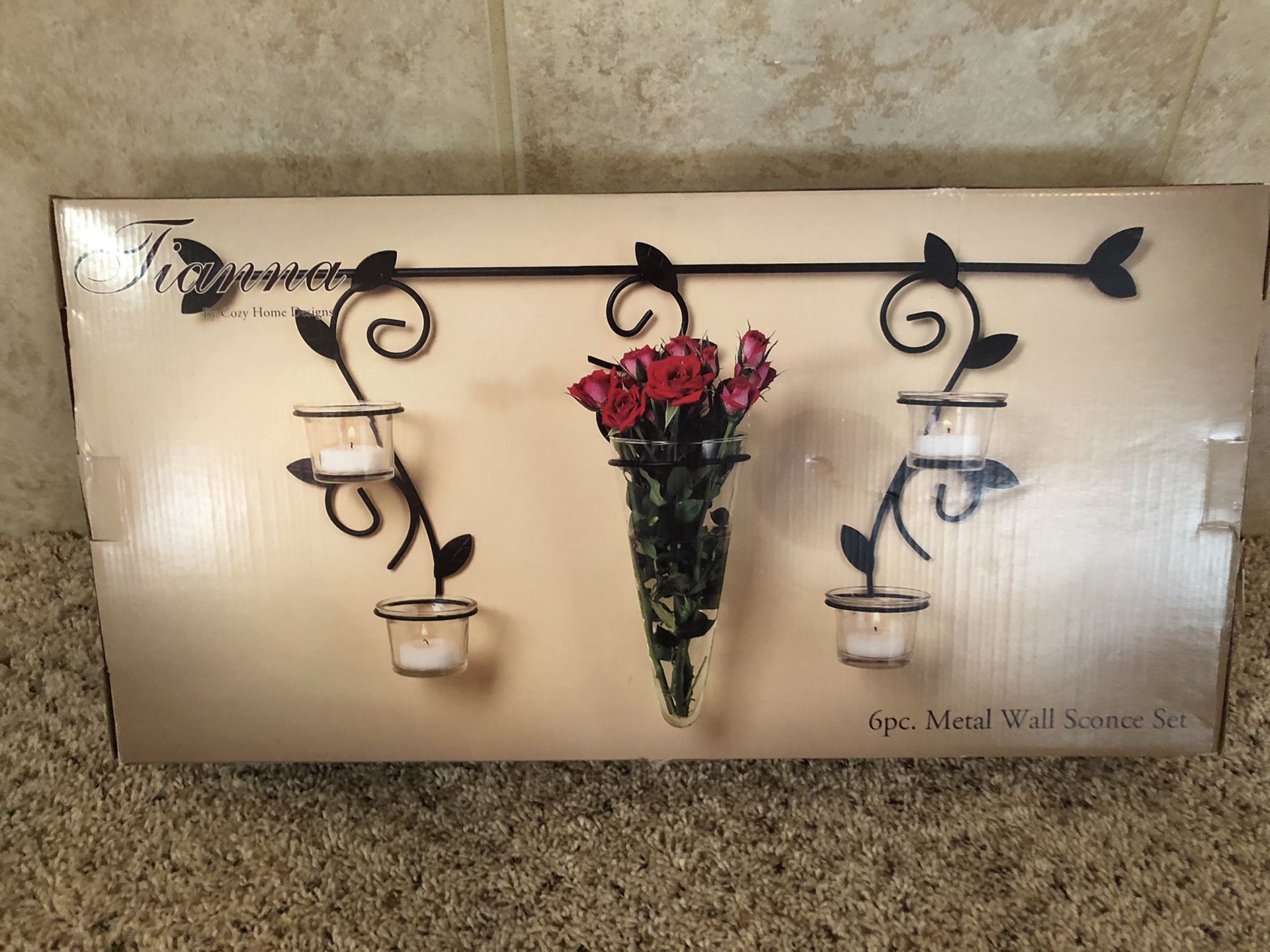 Wall decor with vase and candle holders