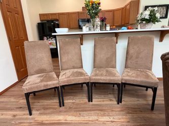 4 Tan Padded Chairs