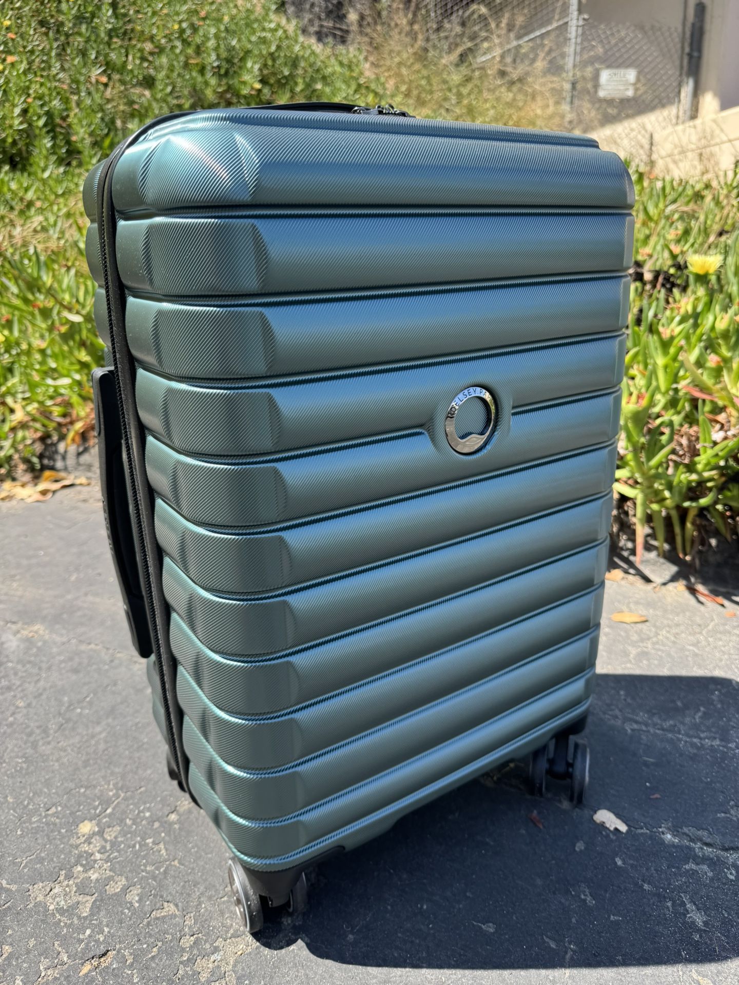 Delsey Slightly Oversized Carry-On Spinner Luggage – Almost 23” – Fits Most Airlines