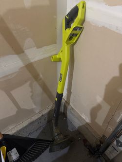 Ryobi trimmer with battery and charger