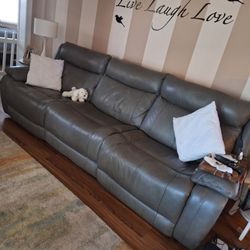 Power reclining leather sofa