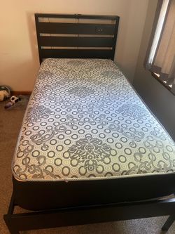 Twin bed frame and mattress