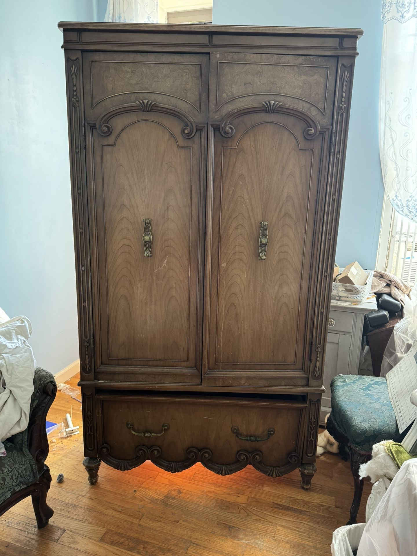 Vintage Armoire With Ornate Carvings - Elegant Storage Solution