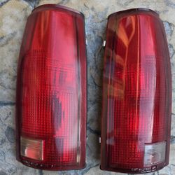 1999 GMC TAIL LIGHTS WITH OFF ROAD COVERS
