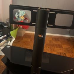 Nice Tv Stand With Wall Mount Attached To It 