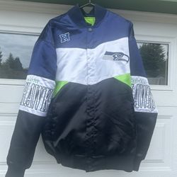 Seattle Seahawks jacket in great shape. I’ve never seen this design before so it’s pretty unique. Extra large size and very warm. Has snap  buttons.  