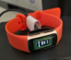Fitbit Charge 6 Fitness Tracker with Coral Band and Charging Cable