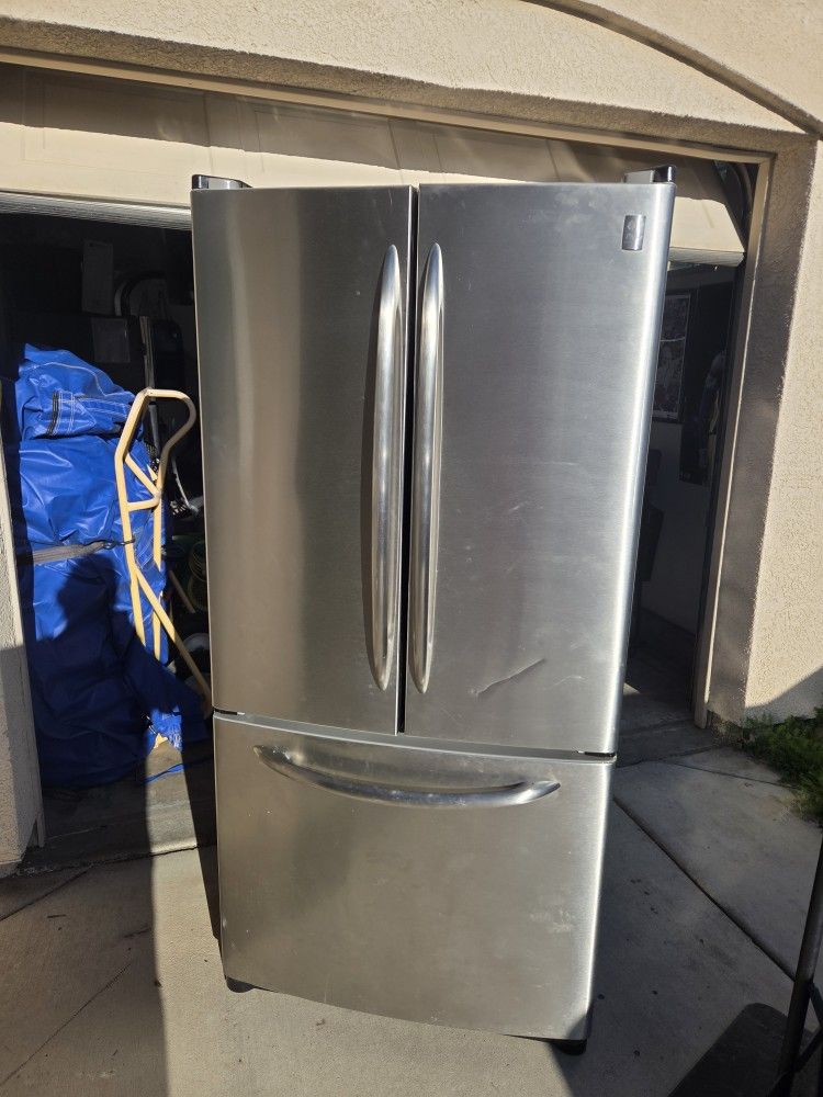 GE 22.2 Cu. Ft. Stainless Bottom-Freezer Refrigerator with Internal Dispenser
