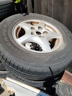 Set Of 5 Lug Rims And Tires For Pontiac/mustang