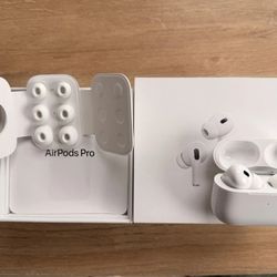 Apple AirPods Pro 2 with MagSafe Case. charger, and extra ear tips