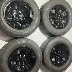 265/65/18 Set Of 4- GM  Six Lug Black Wheels, Tires, Tire, Pressure Sensors, And Center Cap