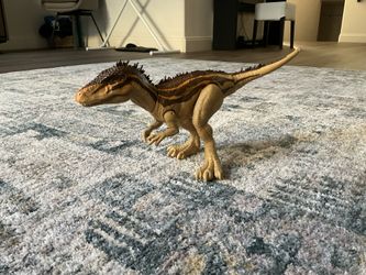 DINOSAUR Got him for about 20 bucks but willing to go for 10 as my son grew out of this.