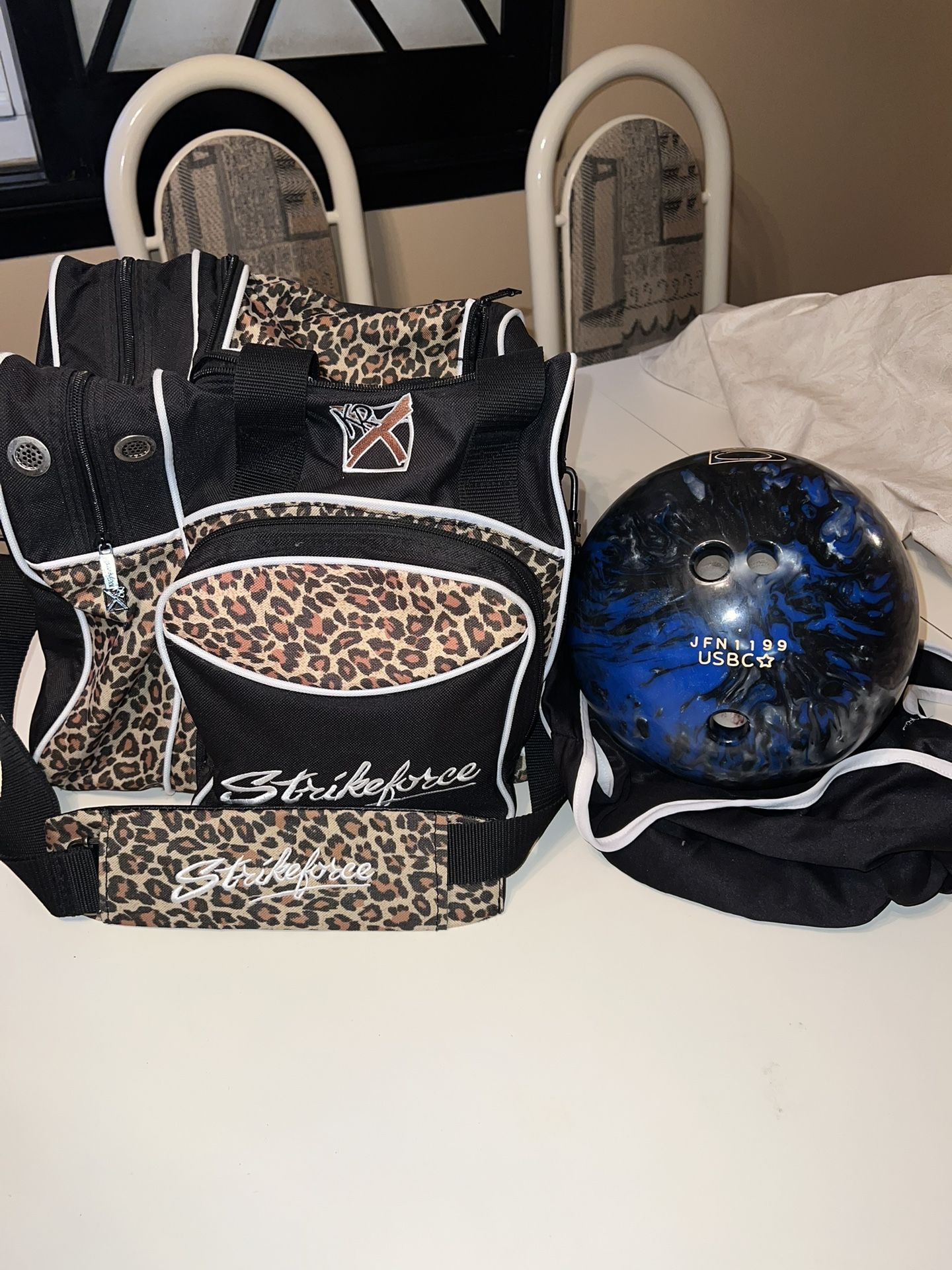 Brunswick T-Zone 12lb Bowling Ball Black/Blue + Leopard Print Carrying Case