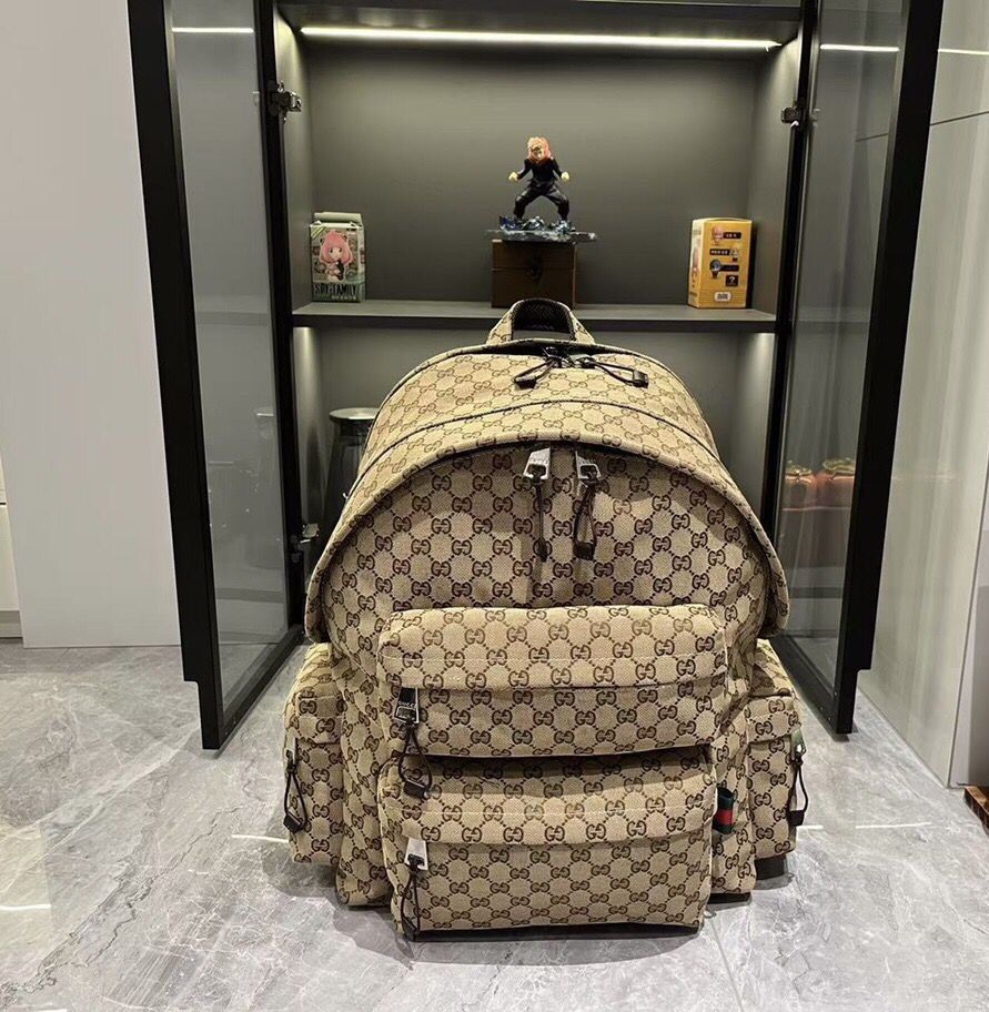 Gucci MEDIUM BACKPACK WITH GUCCI LOGO