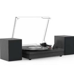 Retro vinyl record player with speakers