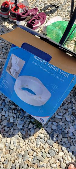 Raised toilet seat
