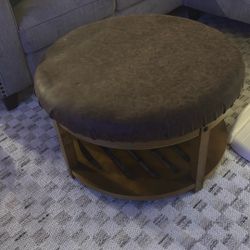 round Wood And Leatherette Coffee Table