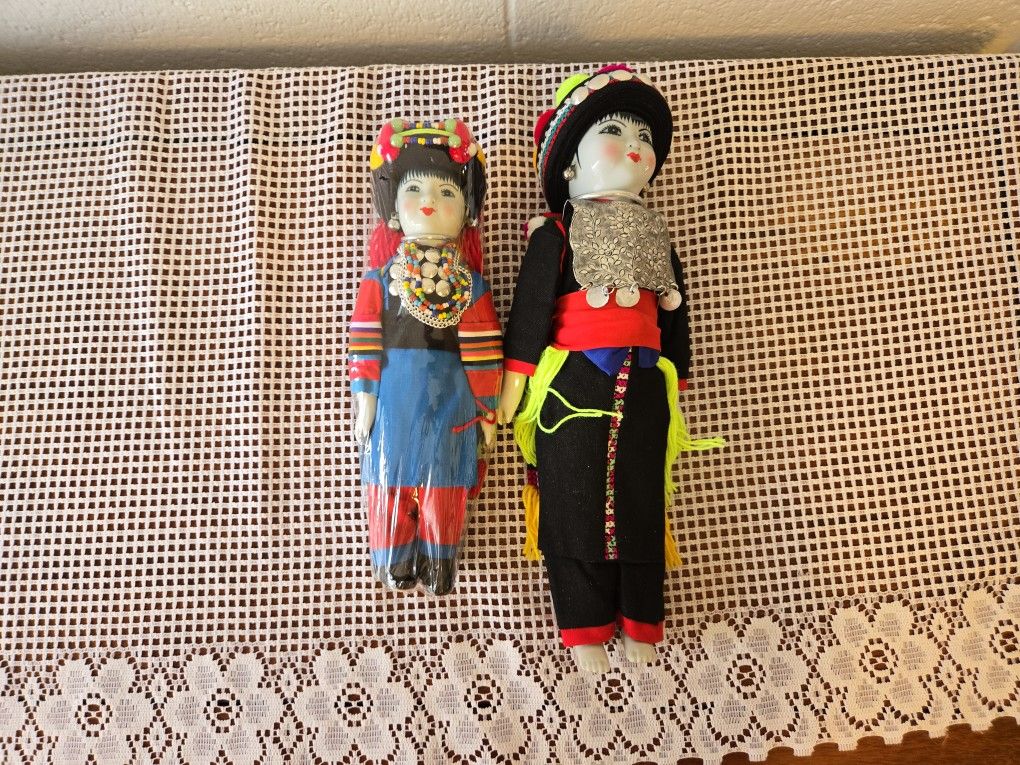 Vintage Pair Of Thai Porcelain Dolls
