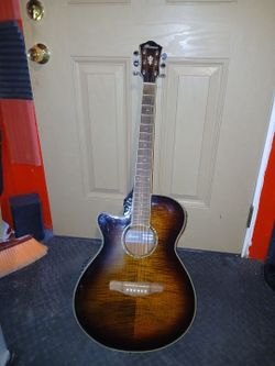 Left handed Ibanes electric acoustic guitar