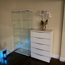 White Chest And Glass Container 