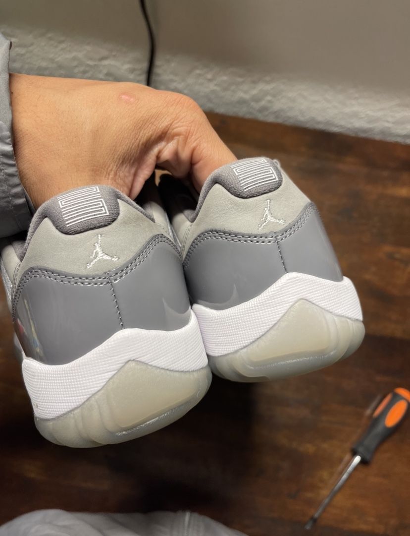 grey low top 11s