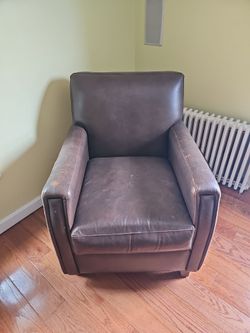 Leather Chair has some scratches.  It's free