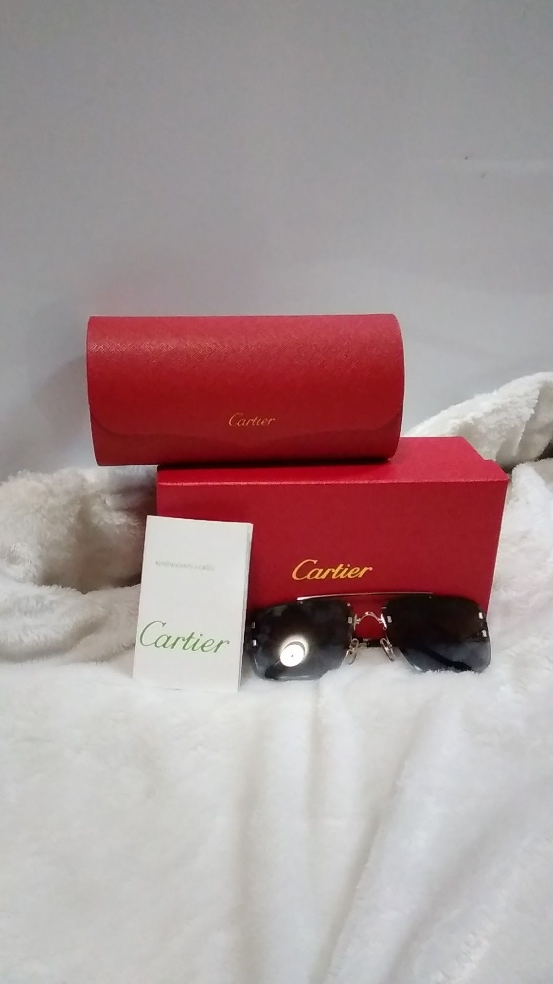 Cartier Rimless Sunglasses, Silver and Blue Lens.