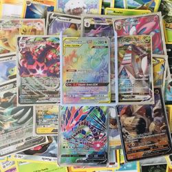 100+ Pokémon Cards.