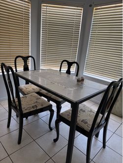 dining table with four chairs