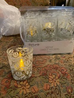 Votive candle holder and gold tea lights