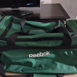 Bulto Reebok 23"W
