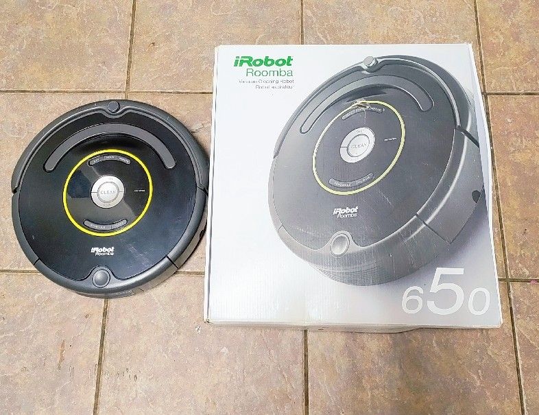 Irobot Roomba automatic vacuum with box and components 65 bucks. It works perfectly and holds a charge. Ready to go. 