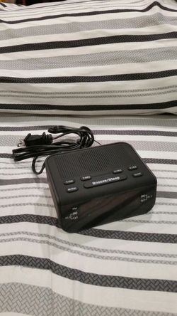 Digital alarm clock with fm radio.