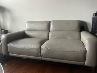 Coaster Elegant Motion Glenmark Upholstered Sofa and Loveseat Set in the Taupe colorway