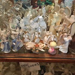 Porcelain angels. Various prices. See all pictures. Inquire if interested