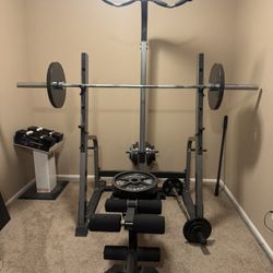 Nautilus Squat rack with bench, weights and Power Block
