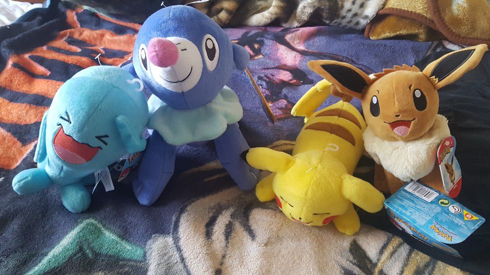 Pokemon plushies with tags brand new tomy