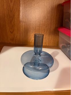 Blue glass candlestick holder
