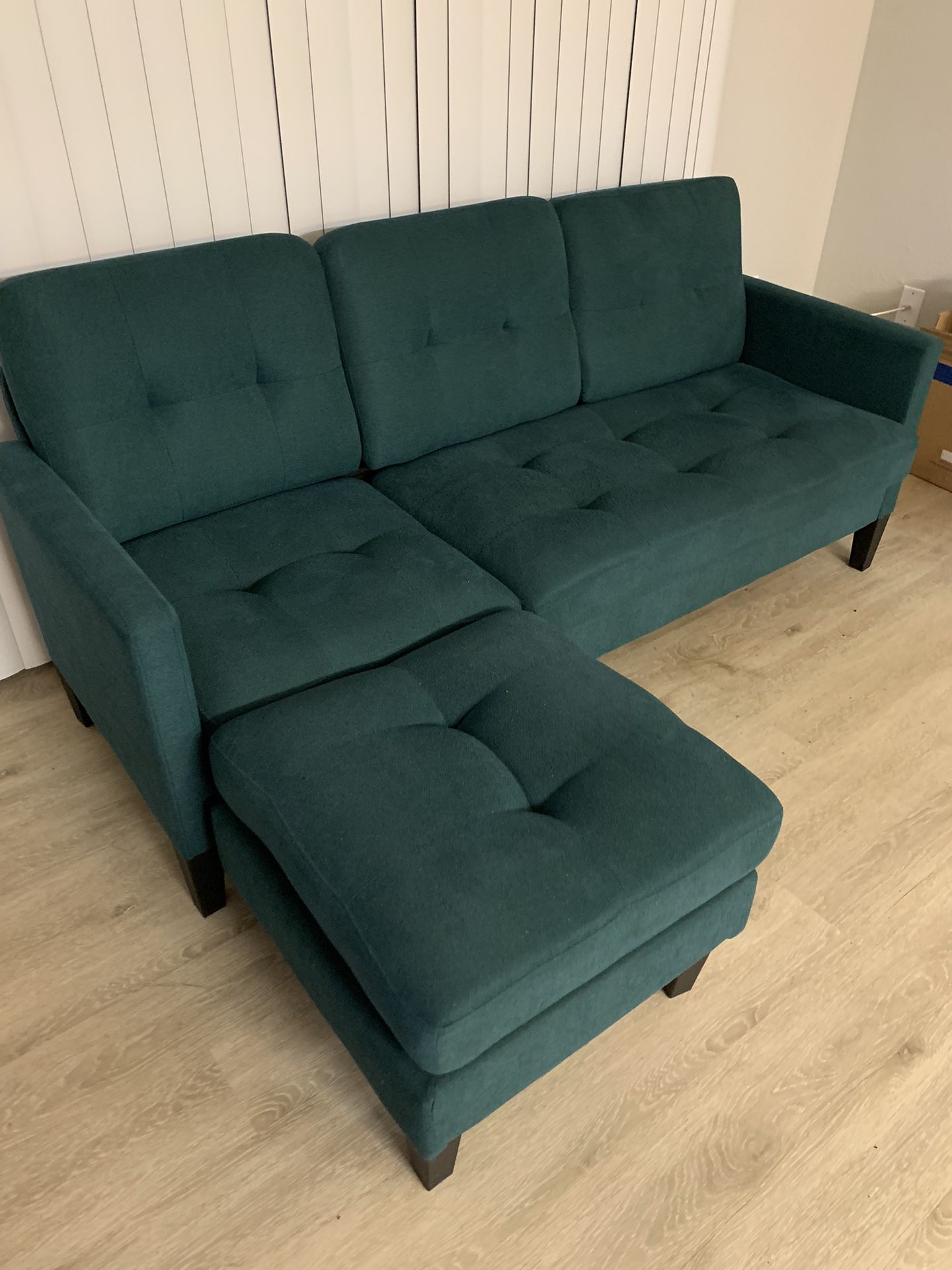 L-Shaped Green Sofa