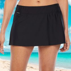 ZeroXposur Women’s Sport Skirtini Swim Sport Black Mini Skort Sz Medium   - New with tag, still in packaging.  - Pair ZeroXposur's Sport Skirtini skor