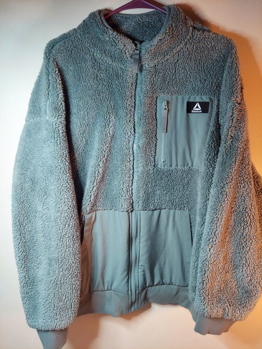 Woman's Reebok Getaway Sherpa With front Zipper Pocket Must Pick Up