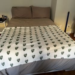 White full-size bed frame