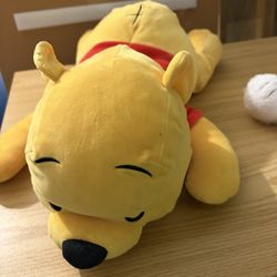 Plush Pooh and alien Toy Story