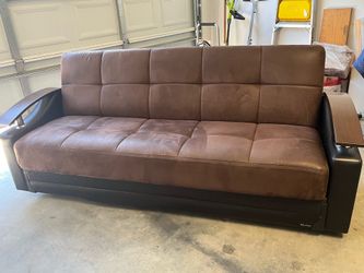 Couch futon and Ottoman.