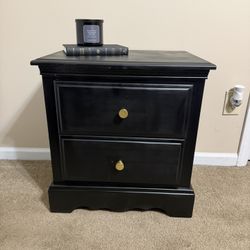 Beautiful refinished nightstand with a modern matte black finish and gold hardware.