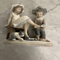 Lladro.  No. 5361.  Try This One