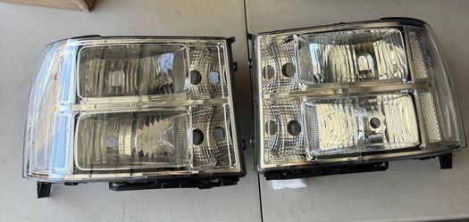 07-13 GMC Sierra Headlights